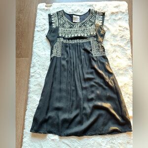 Elegant Black Dress with Intricate Patterns